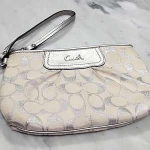 COACH large shimmery silver signature Cs wristlet